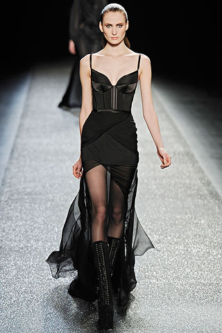 Vestido corset negro falda irregular gajos Nina Ricci